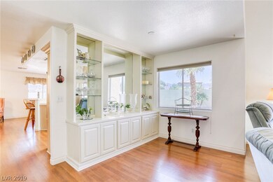 The dining room has a built-in buffet with shelves