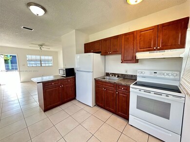 990 Phippen Waiters Rd unit 1, Dania, FL 33004 - photo 7