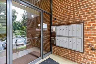 View of property's community featuring a mail area