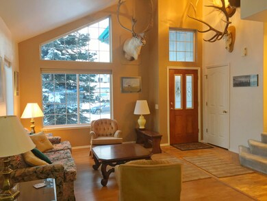 Open living area w/vaulted ceilings