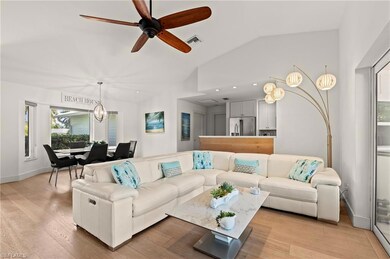 Living room with light wood finished floors, baseb