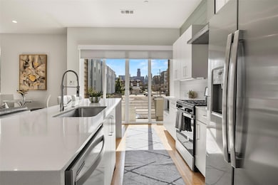 Kitchen with a sink, white cabinetry, modern cabin