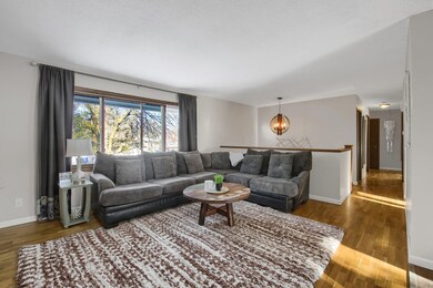 View of the main level family room. Open and bright and neutral paint throughout the living areas.