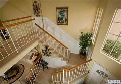 staircase with custom wainscoting