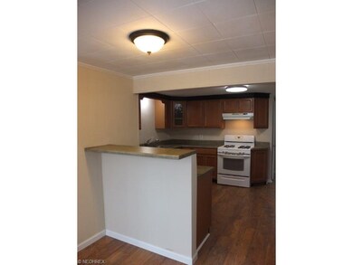 Nicely updated kitchen with breakfast bar.