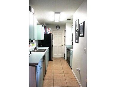 Kitchen. GALLEY KITCHEN WITH PANTRY AND DW,RAN,REF