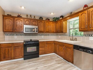 Spacious Eat- In Kitchen with a pantry and new lux