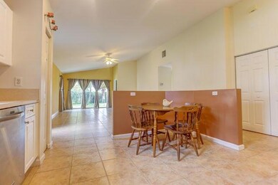 Front 9008 SW Chrysler Cir MLS
