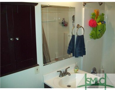 Other. Updated Bathroom has beautiful wood cabinet