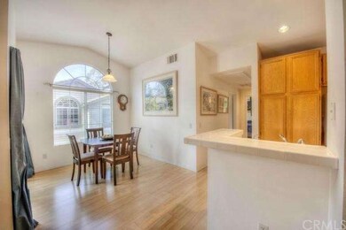 Formal dining room is spacious enough for large ga