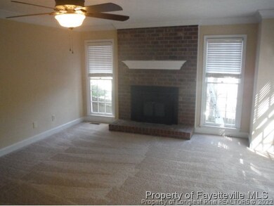 Huge Den with Fireplace.