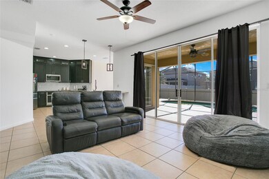 The family room connects well with the kitchen, keeping the chef close to guests when entertaining.
