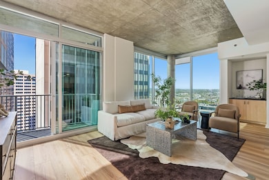 Spacious living room with downtown and Nissan Stadium views