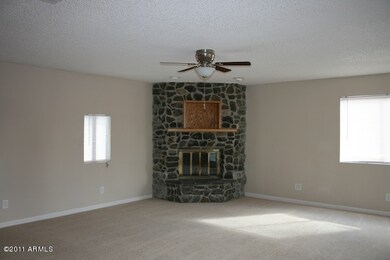 FAMILY ROOM WITH FIELDSTONE FIREPLACE
