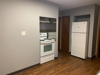 kitchen w new steel stove cover
