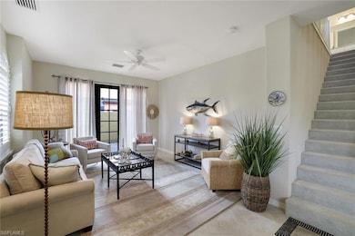Living room featuring tile patterned flooring and 