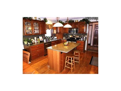 Beautiful cherry cabinetry with a center island