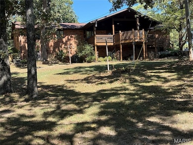 Back view with  large covered composite entertaining deck