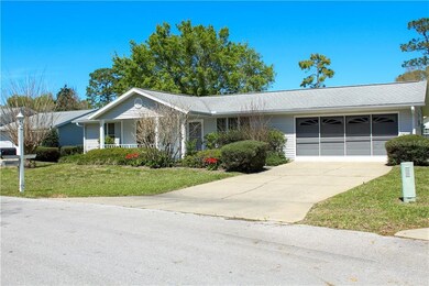 Front view 2 car garage with sliding screen doors