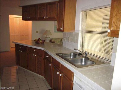 Kitchen with pass through to Florida Room