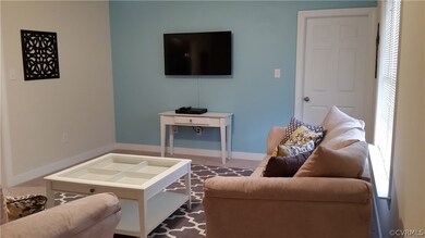 Gorgeous great room with accent wall.