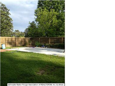 Left side of the back yard has a privacy fence