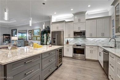 Featuring wine cooler, decorative backsplash, Camb