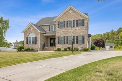 The extended lenth concrete driveway is an added bonus.  Note the shed in the rear.