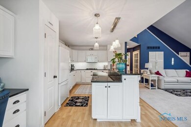 Updated kitchen with granite countertops.