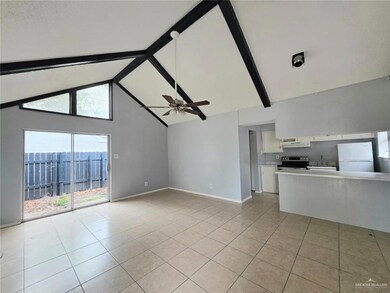 Unfurnished living room featuring high vaulted ceiling, beam ceiling, light tile patterned flooring, and a ceiling fan