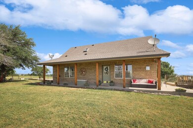 Remodeled farmhouse with peaceful covered porch.