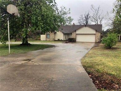 Long driveway that attaches to circle drive.