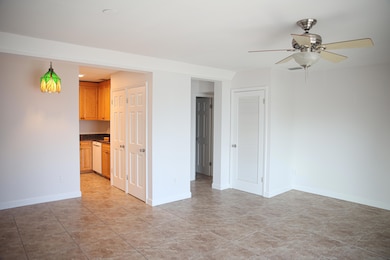 Living room to kitchen and bedrooms