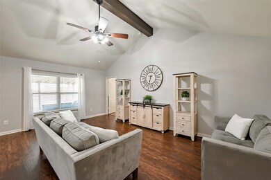 Spacious living room with vaulted ceiling