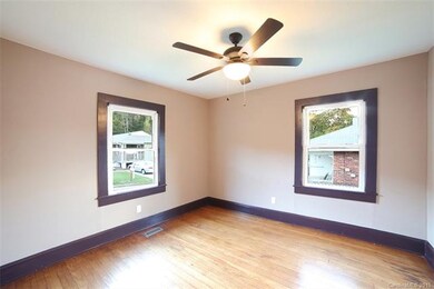 Front bedroom with original hardwoods