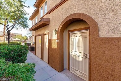 Entrance to property featuring stucco siding and c