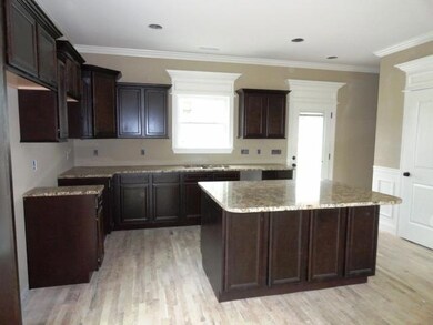 Upgraded staggered kitchen cabinets