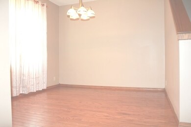 Formal dining room has wood floors!