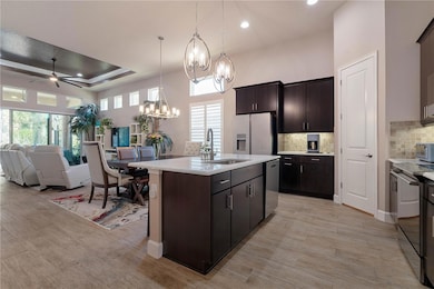 Custom Light Fixtures, Wood Cabinets, & Pantry