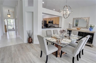 Dining area featuring light wood-type flooring and