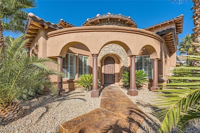 Mediterranean / spanish-style house with stone sid