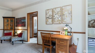 This door leads to a full bath and two bedrooms