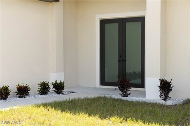 Doorway to property with french doors