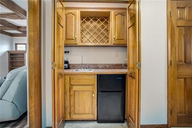 Conveniently located off the family room is a wet 