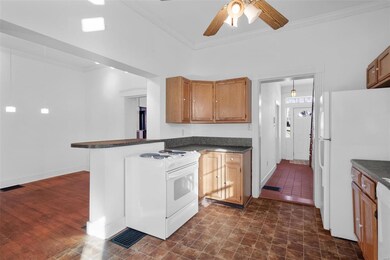 Kitchen is open to dining room.