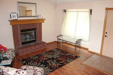 Vaulted ceiling, wood burning fireplace with gas s