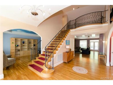This breathtaking 2 story, open foyer features a m