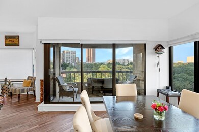 Dining space featuring wood-type flooring and plen