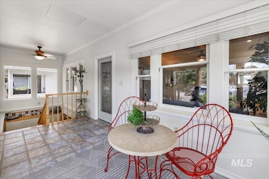 Sunroom / solarium featuring healthy amount of natural light