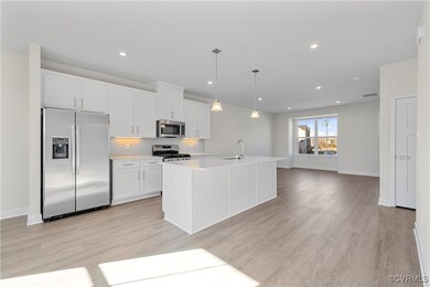 Kitchen with appliances with stainless steel finis